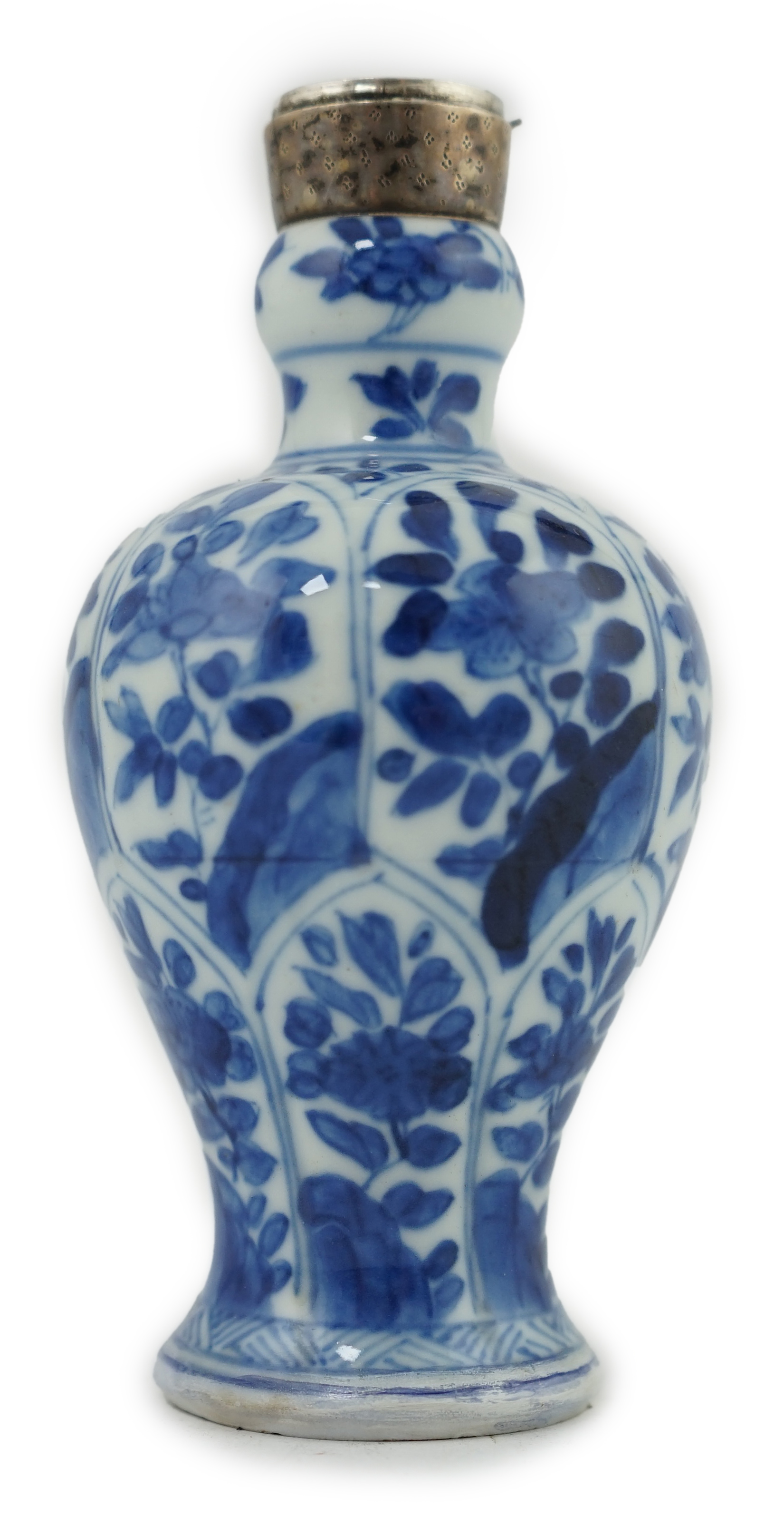 A Chinese small blue and white, white metal mounted vase, Kangxi, 12cm. Condition - poor to fair